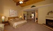 Mourelatos Lakeshore Lodge Hotel Bedroom with Fireplace