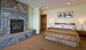 North Tahoe Lodge Hotel Bedroom with Fireplace