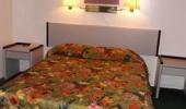 Thunderchief Inn Hotel Guest Queen Bed